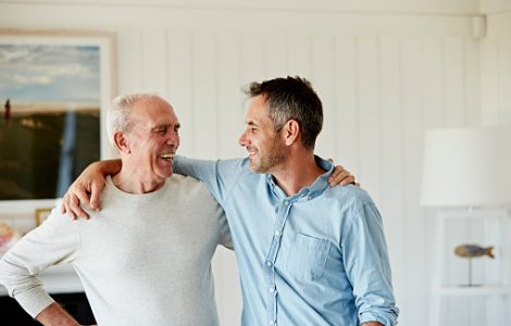 Happy father and son at home
